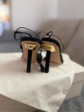 Good American Black Strappy Heels with Gold Heel Caps